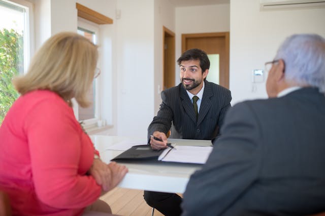 A landlord talking to a property manager